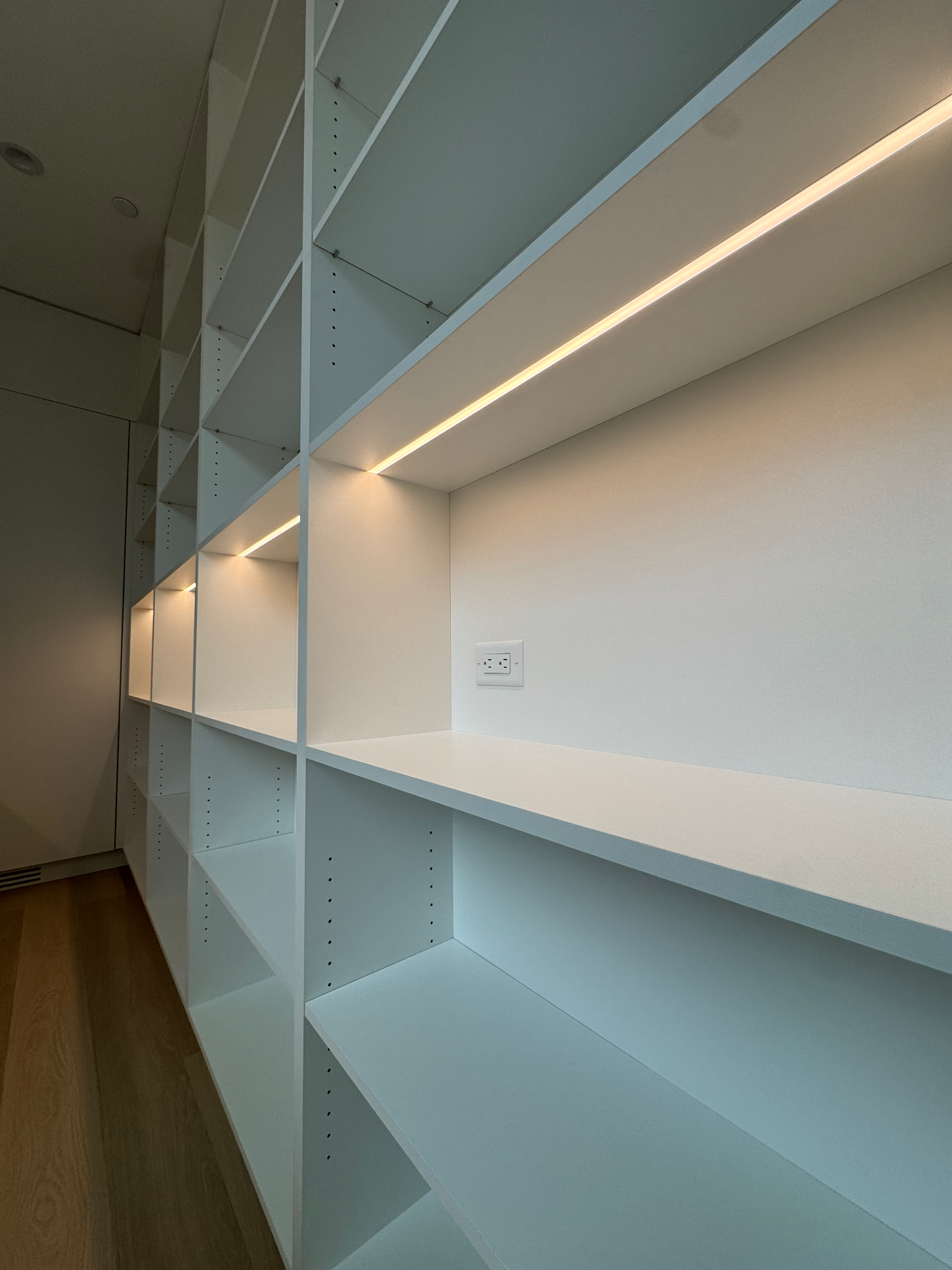 Custom closet LED shelf lighting — JMS Electric luxury custom home project